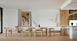 beautiful solid wood oak Australian dining set sitting on oak floors in a modern home extension