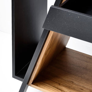 Close up leg detail of a modern bookshelf and room divider sitting on a white floor in Melbourne