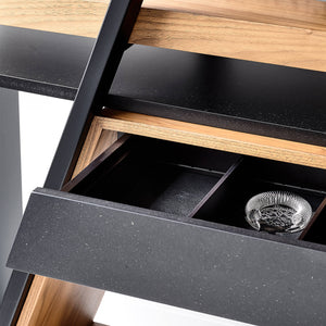a hidden draw appears from a designer bookshelf and room divider to reveal a mixture of cocktail making utensils 